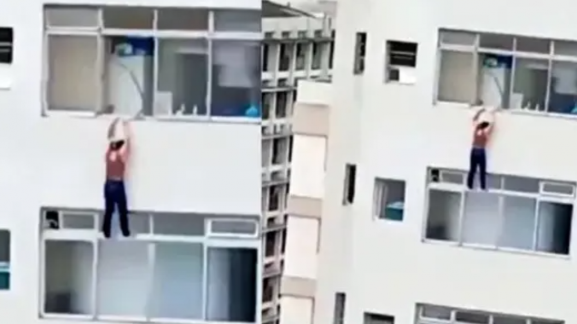 Terror�fico: mujer qued� colgada de un piso 16 al resbalar cuando limpiaba una ventana (video)