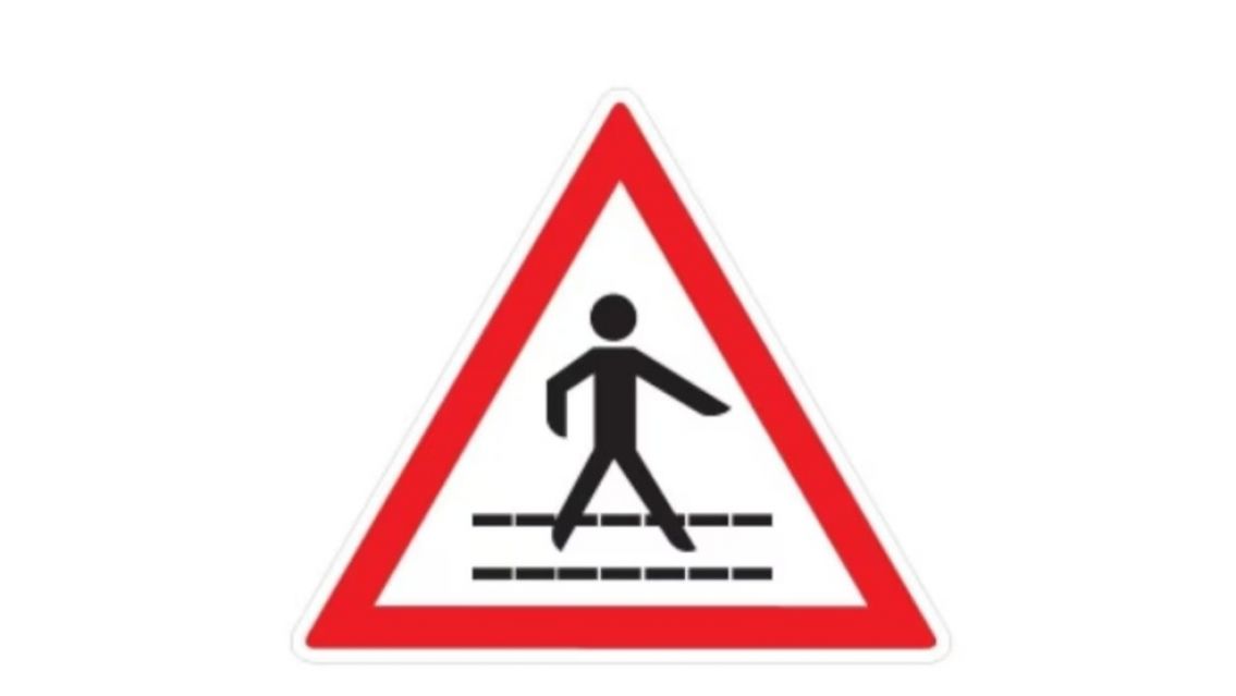 Qu� significa la se�al de tr�nsito triangular con una persona caminando en el medio