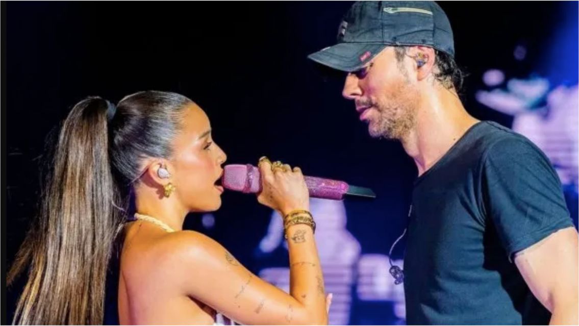 ¿Enrique Iglesias y Emilia Mernes juntos? El beso que casi se dan en el escenario